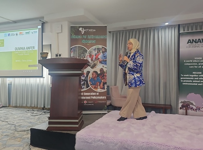Oumnia wearing hijab while opening Women and Youth Day at Africa RCM
